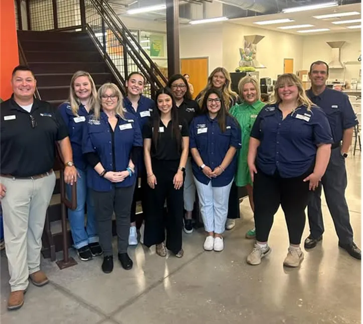 Group photo of Bluebonnet Ford volunteers at New Braunfels Food Bank