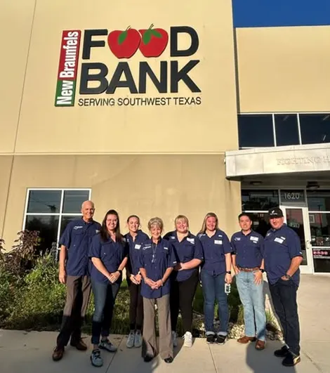 Bluebonnet Ford volunteers outside of New Braunfels Food Bank building